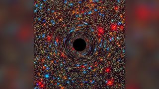This computer-simulated image shows a supermassive black hole at the core of a galaxy.